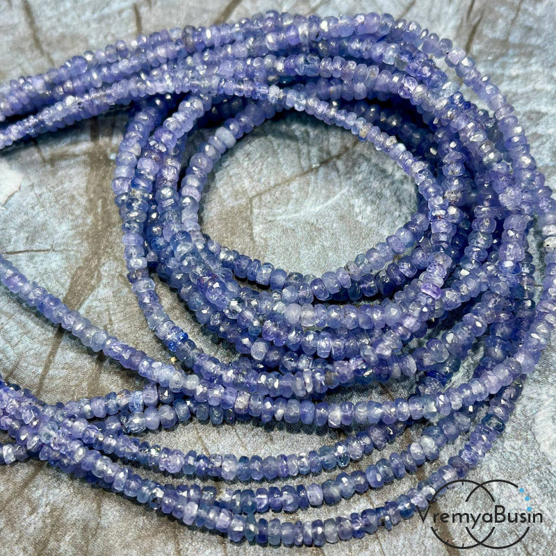 Танзанит натур., рондель граненый ок. 3х2 мм (нить, ок. 40 см.) Танзанит натур., рондель граненый ок. 3х2 мм (нить, ок. 40 см.)