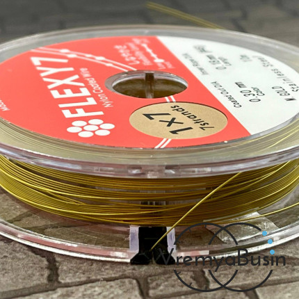 Японский стальной тросик Flexy7 в нейлоновой оплетке, 0.3 мм, цв. GOLD (1 м.)