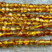Янтарь натур., округлые квадратики ок. 6-7 мм (нить, ок. 60 шт.)