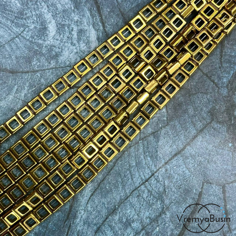 Гематит квадрат, внеш.д. 6 мм / внутр.д. 3 мм, цв. золото  (1/2 нити, ок. 28  шт.)