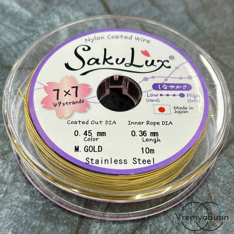 Японский стальной тросик Flexy49 в нейлоновой оплетке,   0.45 мм, цв. GOLD  (катушка 10 м.)