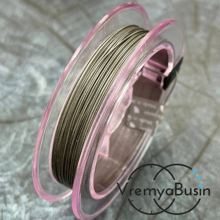 Японский стальной тросик Flexy49 в нейлоновой оплетке,   0.45 мм, цв. CLEAR  (катушка 10 м.)