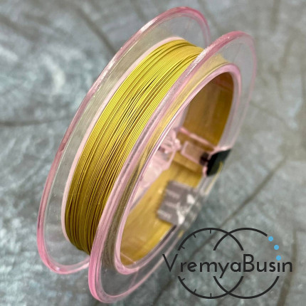 Японский стальной тросик Flexy49 в нейлоновой оплетке,   0.3 мм, цв. GOLD  (катушка 10 м.)