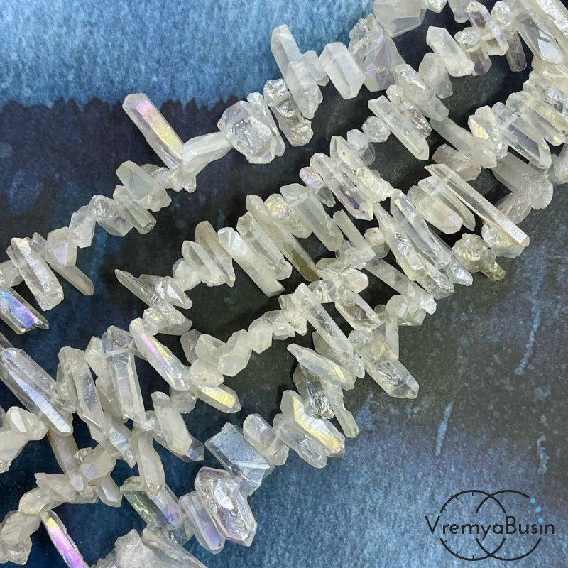 Кварц радужный, мелкие кристаллы, ок. 20-25х6-7 мм, цв. белый (1/2 нити, ок. 32 шт.)