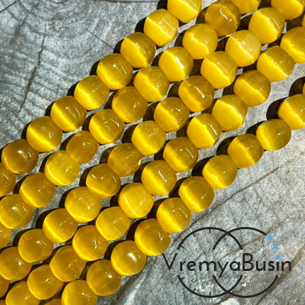 Кошачий глаз имит., бусины с гранями, ок. 10 мм (нить, ок. 38 шт.)