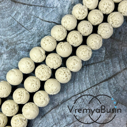 Лава тонир., бусины  шарики, ок. 10 мм,     цв.     слоновой кости       (нить, ок.   38   шт.)
