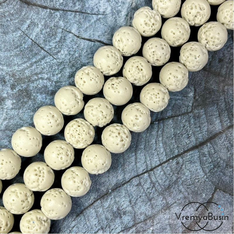 Лава тонир., бусины  шарики, ок. 10 мм,     цв.     слоновой кости       (нить, ок.   38   шт.)