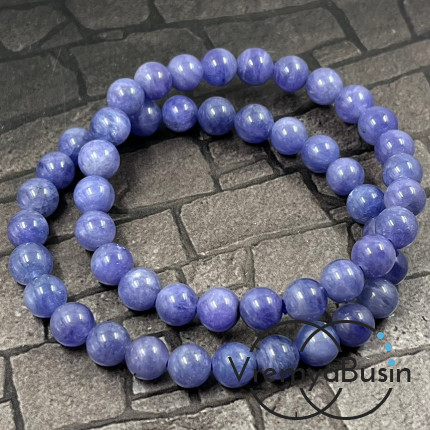 Танзанит натур., шарик гладкий ок. 7.5 мм (1/2 нити, ок. 26 шт.)