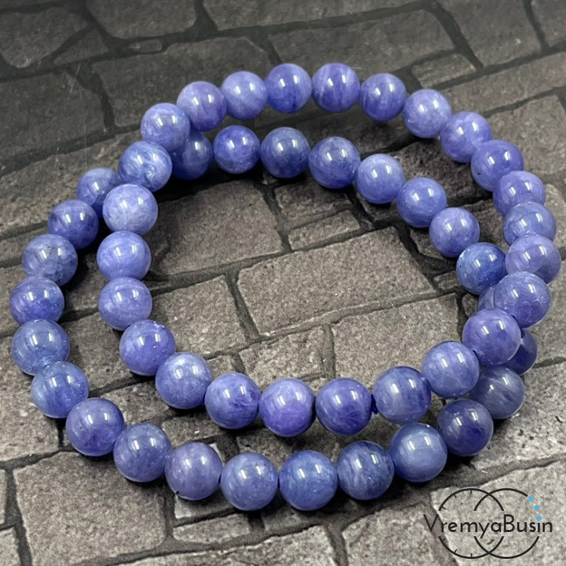 Танзанит натур., шарик гладкий ок. 7.5 мм (1/2 нити, ок. 26 шт.)