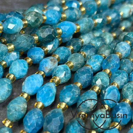 Апатит, бочонок с ювелирной огранкой, ок. 6х8 мм (нить, ок. 38 шт.)