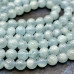 Аквамарин натур., шарик гладкий ок. 6 мм (1/2 нити, ок. 32 шт.)