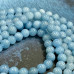 Аквамарин натур., шарик гладкий ок. 6 мм (1/2 нити, ок. 32 шт.)