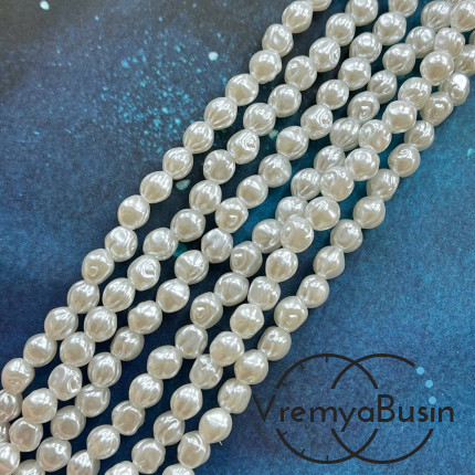 Жемчуг акриловый белый, шарик рифленый 7х8 мм (нить, ок. 50 шт.)
