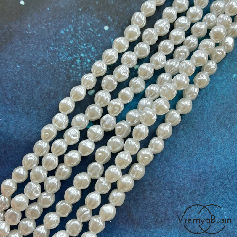 Жемчуг акриловый белый, шарик рифленый 7х8 мм (нить, ок. 50 шт.)