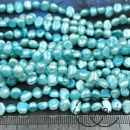 Жемчуг натуральный барочный тонированный (нить, ок. 40 см.) Жемчуг натуральный барочный тонированный (нить, ок. 40 см.)