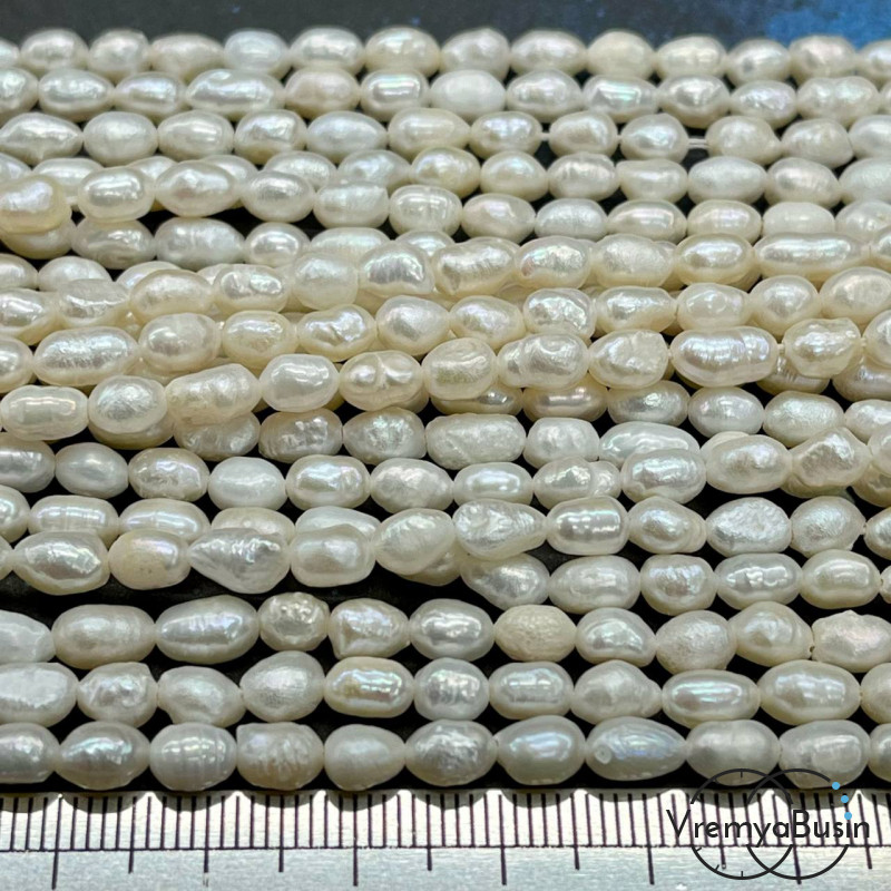 Жемчуг натуральный речной, овальный ок. 4.5х6 мм, цв. белый (нить, ок. 55 шт.)
