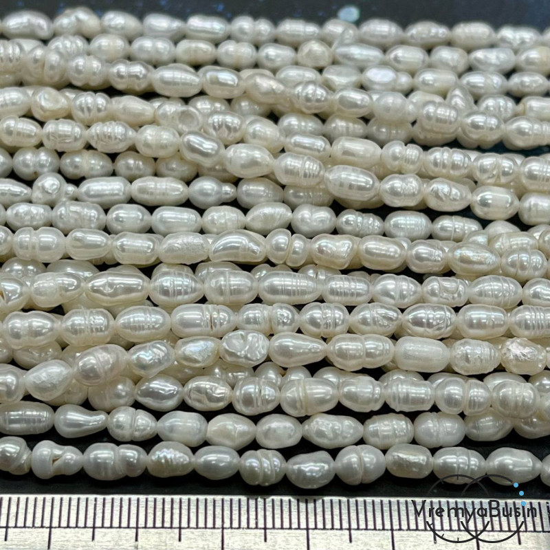 Жемчуг натуральный речной, овальный ок. 4х7 мм, цв. белый (нить, ок. 50 шт.)