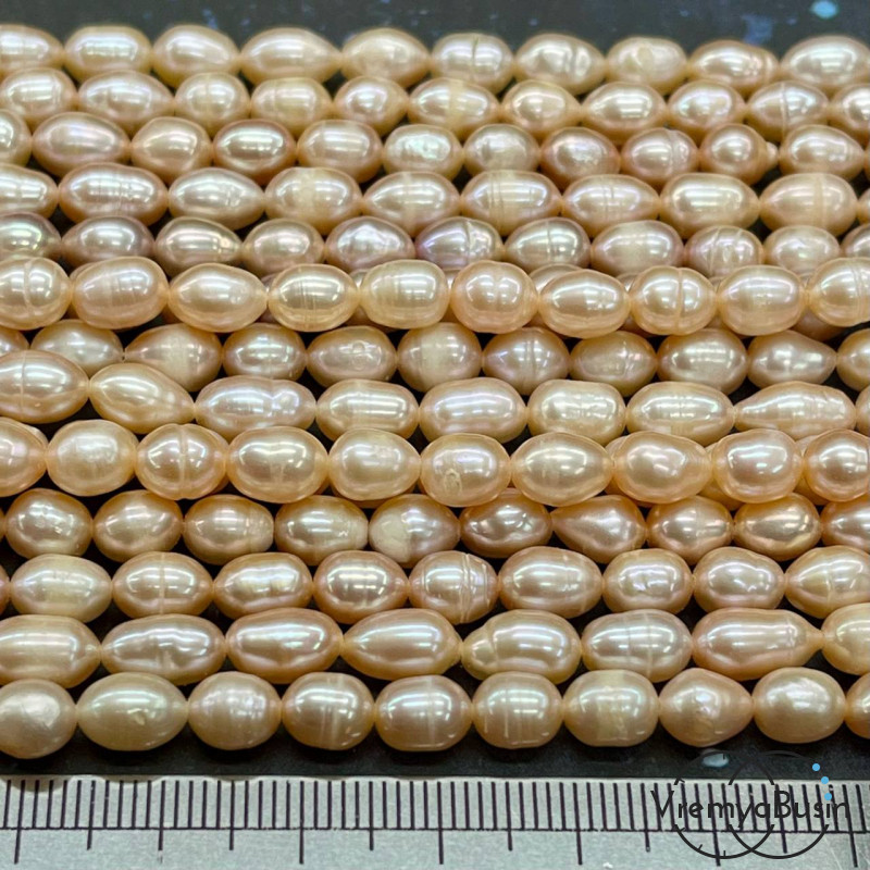 Жемчуг натуральный речной, овальный ок. 5х7 мм, цв. кремовый (нить, ок. 50 шт.)