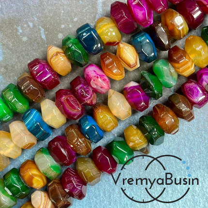 Агат тонир., крупный рондель с гранями, ок. 9х15 (1/2 нити, ок. 20 шт.)