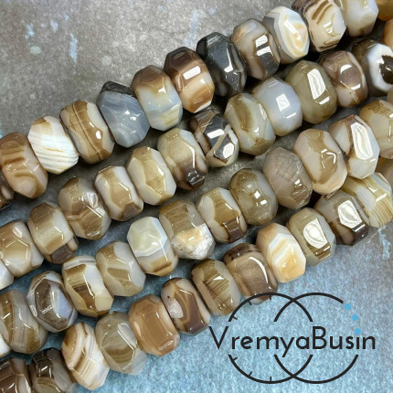 Агат тонир., крупный рондель с гранями, ок. 9х15 (1/2 нити, ок. 20 шт.)