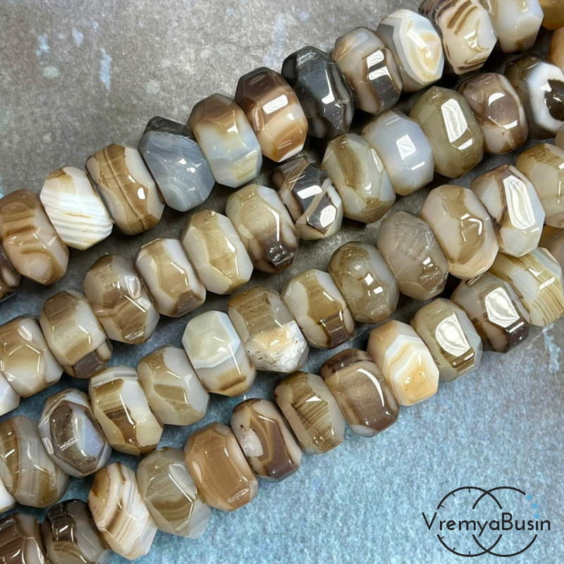 Агат тонир., крупный рондель с гранями, ок. 9х15 (1/2 нити, ок. 20 шт.)