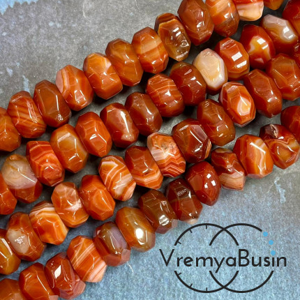 Агат тонир., крупный рондель с гранями, ок. 9х15 (1/2 нити, ок. 20 шт.)