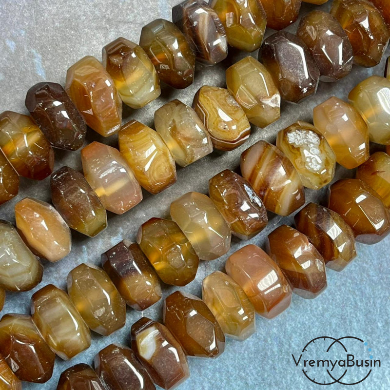 Агат тонир., крупный рондель с гранями, ок. 9х15 (1/2 нити, ок. 20 шт.)