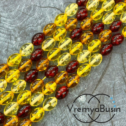 Янтарь, имит. из смолы,  бусины     бочонки 9х13 мм     (нить, ок.   44  шт.)