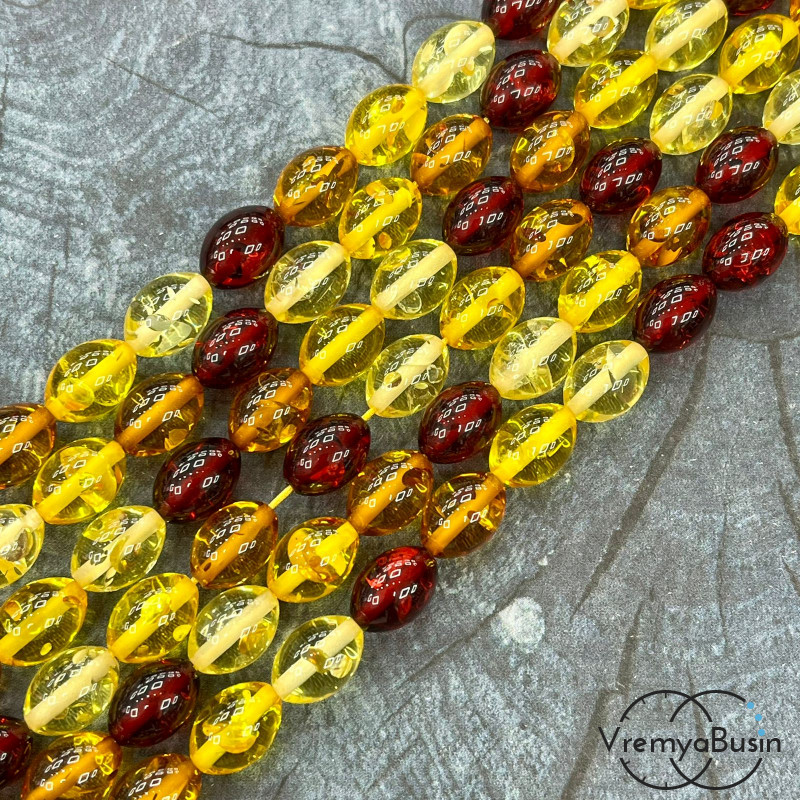 Янтарь, имит. из смолы,  бусины     бочонки 9х13 мм     (нить, ок.   44  шт.)