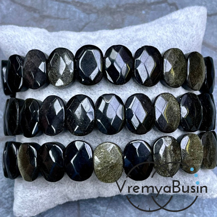 Обсидиан золотой. Бусины граненые с 2 отверстиями 10х14 мм (ок. 19 шт.)