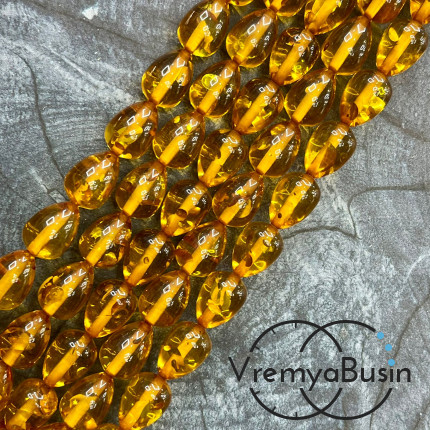 Янтарь, имит. из смолы,  бусины   капли 10х14 мм       (нить, ок.    40 шт.)