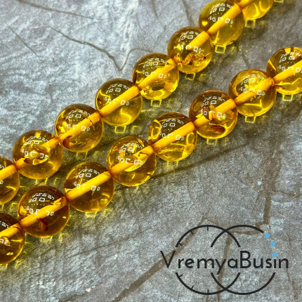 Янтарь, имит. из смолы,  бусины   шарики 14 мм       (нить, ок.   40  шт.)
