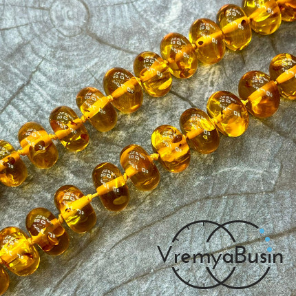 Янтарь, имит. из смолы,  бусины     рондели 14х8 мм     (нить, ок.   60  шт.)