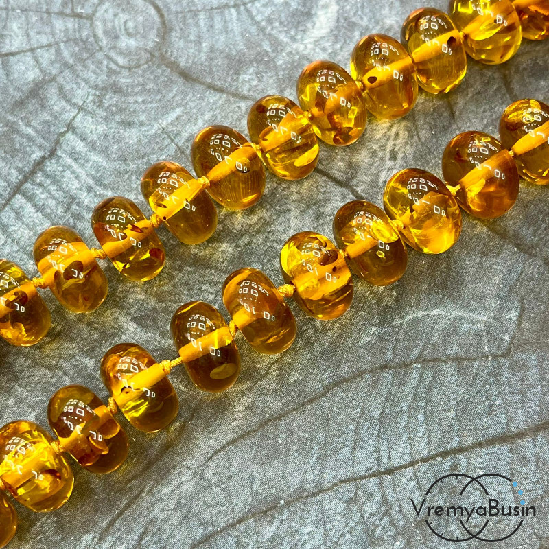 Янтарь, имит. из смолы,  бусины     рондели 14х8 мм     (нить, ок.   60  шт.)