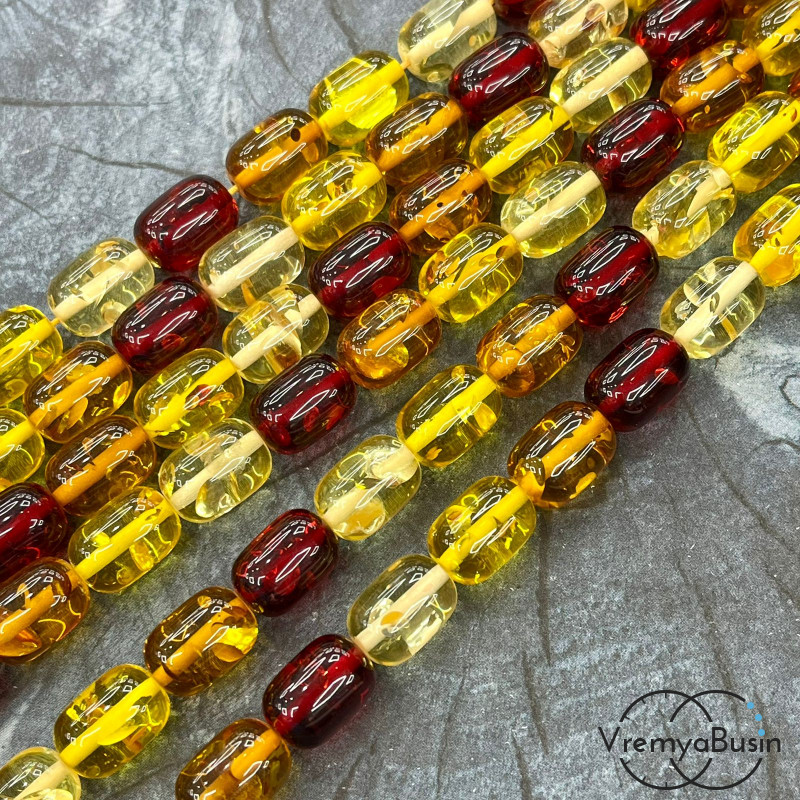 Янтарь, имит. из смолы,  бусины   бочонки 10х14 мм       (нить, ок.    38 шт.)