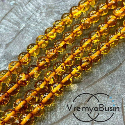 Янтарь, имит. из смолы,  бусины    шарики 10 мм      (нить, ок.   55  шт.)