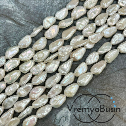 Жемчуг натуральный барочный, овальный плоский ок. 12х18 мм, цв. белый (1/2 нити, ок. 11 шт.) Жемчуг натуральный барочный, овальный плоский ок. 12х18 мм, цв. белый (1/2 нити, ок. 11 шт.)