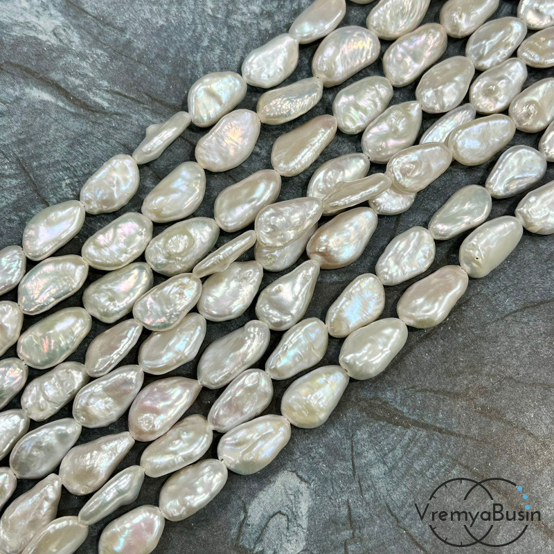 Жемчуг натуральный барочный, овальный плоский ок. 12х18 мм, цв. белый (1/2 нити, ок. 11 шт.) Жемчуг натуральный барочный, овальный плоский ок. 12х18 мм, цв. белый (1/2 нити, ок. 11 шт.)