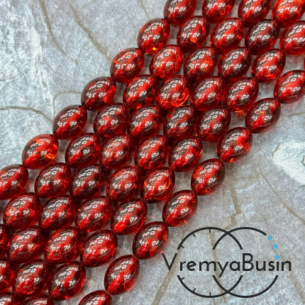 Янтарь, имит. из смолы,  бусины     бочонки 9х13 мм     (нить, ок.   44  шт.)