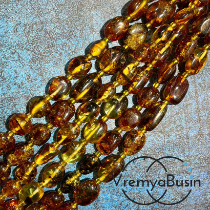 Янтарь натур., галтовка овальная ок. 10х12 мм (нить, ок. 35 шт.)