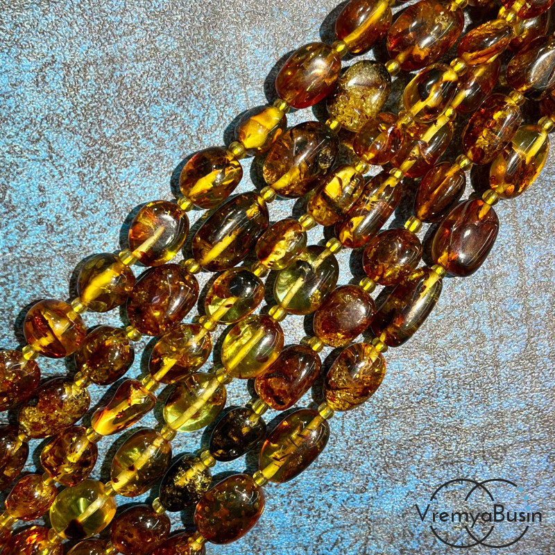 Янтарь натур., галтовка овальная ок. 10х12 мм (нить, ок. 35 шт.)