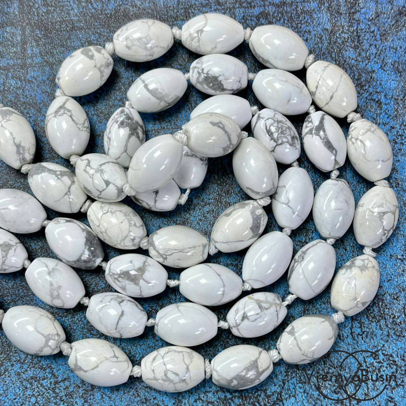 Кахолонг, бочонок гладкий 10х14 мм (1/2 нити, ок. 14 шт.)