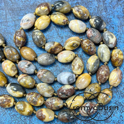 Агат, бочонок гладкий 10х14 мм (1/2 нити, ок. 14 шт.)