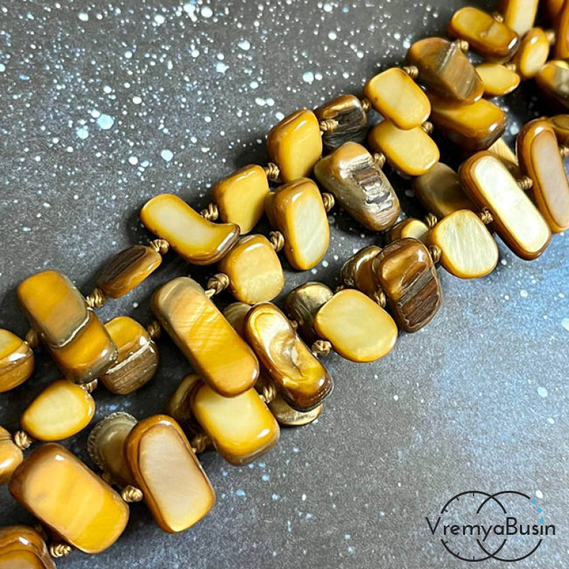 Перламутр тонир., галтовка палочки ок. 10-30х8 мм, цв. желтый (1/2 нити, ок. 60 см., ок.55 шт.)