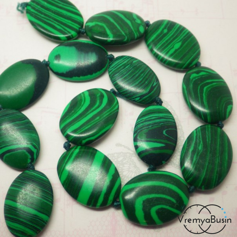 Малахит прессованный. Овал плоский. 20х15 мм