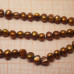 Жемчуг натуральный речной. Коричневый округлый 6мм