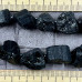 Чёрный турмалин - шерл, бусины крупные сколы, ок. 16-18 мм (1/2 нити, ок. 11 шт.)