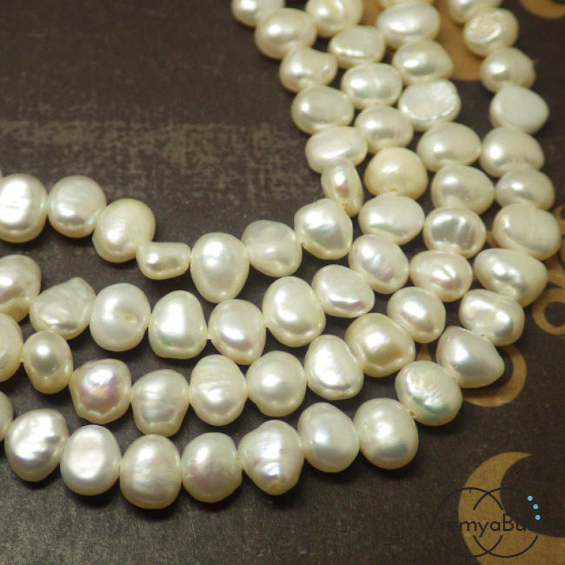 Жемчуг натуральный речной. Белый плоский 7х5 мм