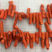 Коралл натур., крупные веточки цв.оранжевый (1/2 нити, 20 шт.)