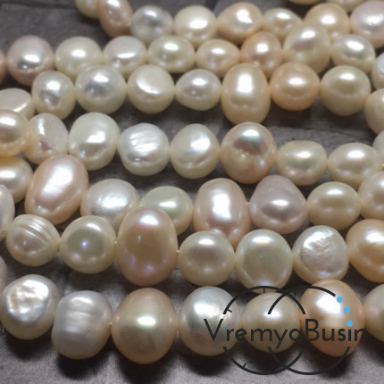 Жемчуг натуральный речной, бело-кремовый овальный ок.7х9 мм (1 шт.)